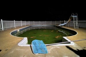 Swimming pool that has turned dark green
